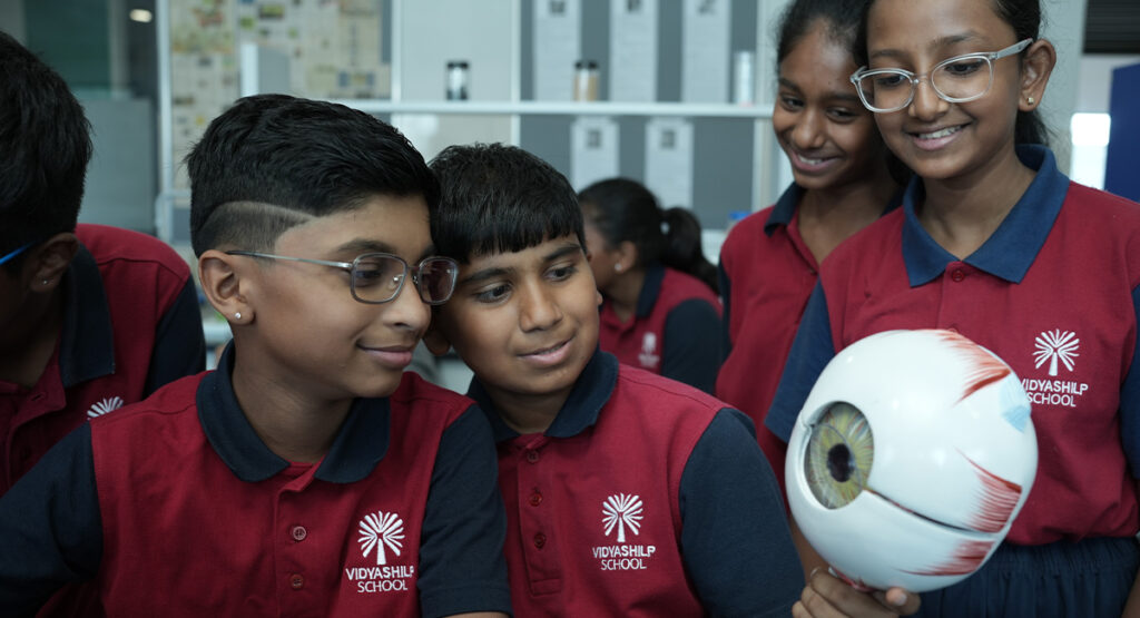 Children participating in classroom activities at Vidyashilp School, Banashankari.