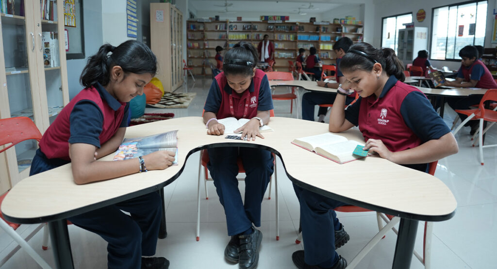 School library with students reading and learning